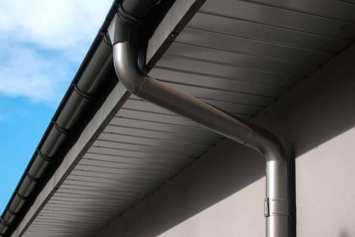 Corrosion-resistant galvanized gutters installed on a commercial building in St Louis